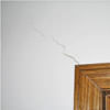 wall cracks along a doorway in a Grayson home.