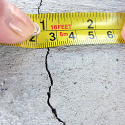 A crack in a poured concrete wall that's showing a normal crack during curing in Proctorville