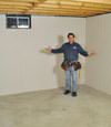 Marietta basement insulation covered by EverLast™ wall paneling, with SilverGlo™ insulation underneath